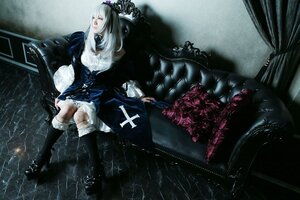 Rating: Safe Score: 0 Tags: 1girl boots dress frills gothic_lolita lolita_fashion long_hair red_eyes silver_hair sitting solo suigintou water white_hair wings User: admin