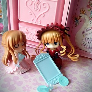 Rating: Safe Score: 0 Tags: blonde_hair blue_eyes bow chibi doll dress flower frills long_hair multiple_girls rose shinku solo twintails User: admin