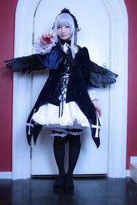 Rating: Safe Score: 0 Tags: 1girl apple black_legwear black_wings closed_eyes dress feathers food frills fruit gothic_lolita hairband holding holding_fruit lolita_fashion long_sleeves pantyhose solo standing suigintou white_hair wings User: admin