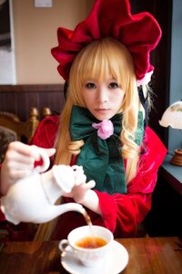 Rating: Safe Score: 0 Tags: 1girl blonde_hair blue_eyes blurry blurry_background blurry_foreground bonnet bow cup depth_of_field dress flower lips long_hair long_sleeves looking_at_viewer photo pink_rose rose saucer shinku sitting solo teacup User: admin