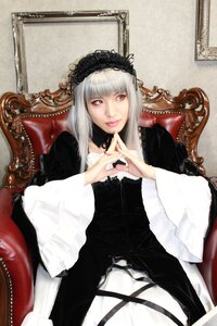 Rating: Safe Score: 0 Tags: 1girl bangs black_dress dress frills gothic_lolita hairband lace lips lolita_fashion long_hair long_sleeves looking_at_viewer red_eyes silver_hair sitting solo suigintou traditional_media wide_sleeves User: admin
