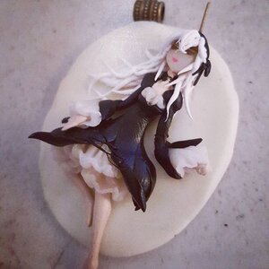 Rating: Safe Score: 0 Tags: 1girl black_dress closed_mouth doll dress long_hair long_sleeves solo standing suigintou white_hair User: admin