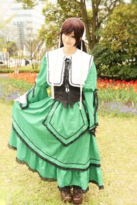 Rating: Safe Score: 0 Tags: 1girl brown_hair day dress flower green_dress green_eyes long_hair long_sleeves looking_at_viewer outdoors smile solo standing suiseiseki tree User: admin