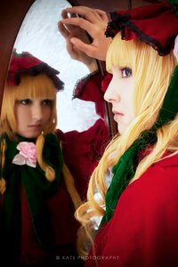Rating: Safe Score: 0 Tags: bangs blonde_hair blue_eyes blurry bow cup depth_of_field flower hat long_hair multiple_girls photo realistic shinku solo teacup User: admin