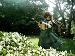 Rating: Safe Score: 0 Tags: 1girl apron doll dress flower frills green_dress green_eyes heterochromia holding instrument long_hair long_sleeves looking_at_viewer nature outdoors solo standing suiseiseki tree very_long_hair watering_can User: admin