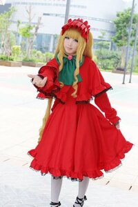Rating: Safe Score: 0 Tags: 1girl blonde_hair blurry bonnet bow building capelet dress long_hair long_sleeves outdoors pantyhose photo red_dress shinku solo standing white_legwear User: admin