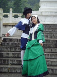 Rating: Safe Score: 0 Tags: 2girls black_hair dress green_dress hat long_sleeves multiple_cosplay multiple_girls railing stairs standing tagme User: admin