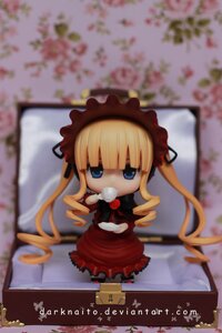 Rating: Safe Score: 0 Tags: 1girl blonde_hair blue_eyes blurry blurry_background blurry_foreground chibi cup depth_of_field doll dress drill_hair figure flower food long_hair motion_blur photo photo_background shinku sitting solo teacup User: admin