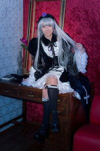 Rating: Safe Score: 0 Tags: 1girl chair dress flower frills gothic_lolita long_hair shoes silver_hair sitting smile solo suigintou thighhighs User: admin