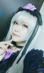 Rating: Safe Score: 0 Tags: 1girl choker closed_mouth fingernails flower hair_ornament lips looking_at_viewer red_eyes solo suigintou User: admin
