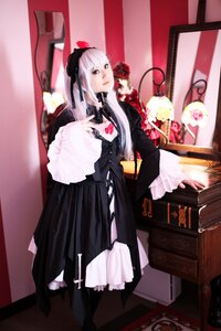 Rating: Safe Score: 0 Tags: 1girl bangs black_dress dress frills gothic_lolita hairband heart lolita_fashion long_hair silver_hair solo standing suigintou User: admin