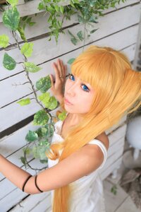 Rating: Safe Score: 0 Tags: 1girl bangs blonde_hair blue_eyes blunt_bangs blurry depth_of_field dress ivy leaf lips long_hair looking_at_viewer photo plant potted_plant shinku solo upper_body vines white_dress User: admin