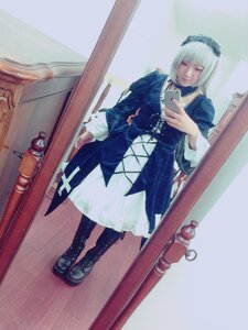 Rating: Safe Score: 0 Tags: 1girl bangs black_legwear dress full_body holding indoors long_sleeves pantyhose phone photo shoes solo standing suigintou traditional_media User: admin