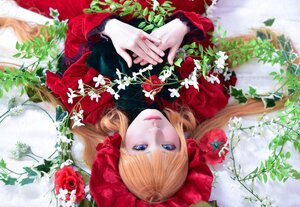 Rating: Safe Score: 0 Tags: 1girl bangs blonde_hair blue_eyes bow dress flower lips long_hair long_sleeves looking_at_viewer lying on_back red_dress rose shinku solo User: admin