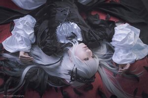 Rating: Safe Score: 0 Tags: 1girl bangs closed_mouth dress feathers frills hairband long_hair long_sleeves silver_hair solo suigintou very_long_hair wide_sleeves User: admin