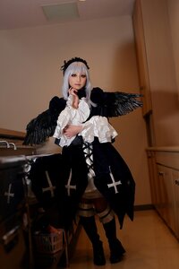 Rating: Safe Score: 0 Tags: 1girl black_wings boots cross feathered_wings feathers indoors latin_cross long_hair long_sleeves photo silver_hair solo standing star_(symbol) suigintou wings User: admin