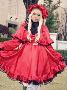 Rating: Safe Score: 0 Tags: 1girl bangs blonde_hair blue_eyes blurry blurry_background bonnet closed_mouth day depth_of_field dress frills long_hair long_sleeves looking_at_viewer outdoors photo red_dress shinku solo standing User: admin