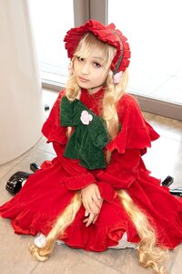 Rating: Safe Score: 0 Tags: 1girl blonde_hair bonnet capelet dress long_hair long_sleeves looking_at_viewer red_dress shinku shoes sitting solo User: admin