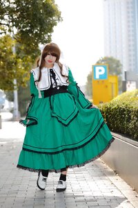 Rating: Safe Score: 0 Tags: 1girl blurry brown_hair closed_eyes closed_mouth day depth_of_field dress full_body green_dress outdoors photo solo standing suiseiseki User: admin