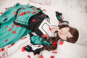 Rating: Safe Score: 0 Tags: 1girl brown_hair dress finger_to_mouth green_dress green_eyes jewelry lips long_hair long_sleeves looking_at_viewer petals rose_petals solo suiseiseki User: admin