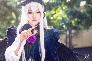 Rating: Safe Score: 0 Tags: 1girl black_wings blurry blurry_background depth_of_field dress finger_to_mouth flower long_hair long_sleeves looking_at_viewer ribbon solo suigintou upper_body white_hair wings User: admin