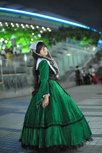 Rating: Safe Score: 0 Tags: 1girl black_eyes black_hair blurry blurry_background depth_of_field dress full_body green_dress hat long_hair long_sleeves looking_at_viewer outdoors solo standing suiseiseki User: admin