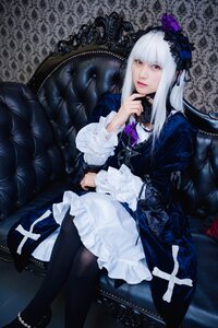 Rating: Safe Score: 0 Tags: 1girl black_legwear chair couch dress flower frills gothic_lolita lips lolita_fashion long_hair long_sleeves looking_at_viewer pantyhose silver_hair sitting solo suigintou User: admin