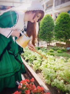 Rating: Safe Score: 0 Tags: 1girl blurry brown_hair day depth_of_field dress flower green_dress holding long_hair long_sleeves outdoors sitting solo suiseiseki tree User: admin