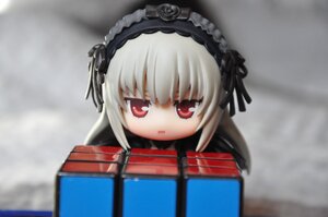 Rating: Safe Score: 0 Tags: 1girl bangs blurry blurry_background chibi depth_of_field doll eyebrows_visible_through_hair hairband long_hair looking_at_viewer photo red_eyes silver_hair solo suigintou User: admin
