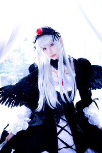 Rating: Safe Score: 0 Tags: 1girl bangs black_wings dress feathers flower frills gothic_lolita hairband lolita_fashion long_hair long_sleeves looking_at_viewer red_eyes solo suigintou wings User: admin