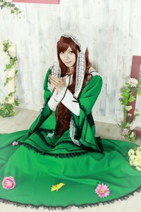 Rating: Safe Score: 0 Tags: 1girl brown_hair dress flower green_dress green_eyes long_hair looking_at_viewer sitting solo suiseiseki User: admin