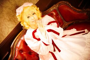 Rating: Safe Score: 0 Tags: 1girl blonde_hair chair couch dress green_eyes hat hinaichigo looking_at_viewer ribbon sitting smile solo white_dress User: admin