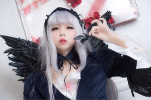 Rating: Safe Score: 0 Tags: 1girl black_ribbon black_wings feathers flower hairband long_hair long_sleeves photo red_eyes ribbon rose silver_hair solo suigintou wings User: admin