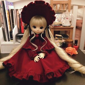 Rating: Safe Score: 0 Tags: 1girl bangs blonde_hair blue_eyes bonnet doll dress flower indoors long_hair long_sleeves looking_at_viewer photo red_dress rose shinku sidelocks sitting solo twintails very_long_hair User: admin