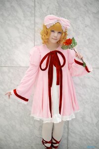 Rating: Safe Score: 0 Tags: 1girl blonde_hair blue_eyes dress flower full_body hat hinaichigo holding_flower leg_ribbon long_sleeves looking_at_viewer pink_dress ribbon short_hair smile solo standing User: admin