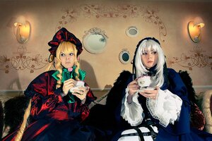 Rating: Safe Score: 0 Tags: 2girls blonde_hair blue_eyes cup dress long_hair multiple_cosplay multiple_girls shinku sitting tagme teacup wide_sleeves User: admin