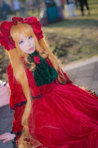 Rating: Safe Score: 0 Tags: 1girl blonde_hair blue_eyes blurry blurry_background bonnet depth_of_field dress flower lips long_hair looking_at_viewer photo red_dress red_flower rose shinku sitting solo User: admin