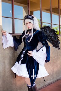 Rating: Safe Score: 0 Tags: 1girl dress feathers frills gothic_lolita indoors lolita_fashion long_hair long_sleeves solo standing suigintou wide_sleeves window wings User: admin