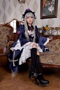 Rating: Safe Score: 0 Tags: 1girl black_legwear boots chair crossed_legs dress flower frills indoors lips long_hair looking_at_viewer silver_hair sitting solo suigintou User: admin