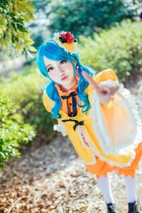 Rating: Safe Score: 0 Tags: 1girl blue_hair blurry day depth_of_field dress flower hair_flower hair_ornament jewelry kanaria lips looking_at_viewer outdoors photo solo User: admin