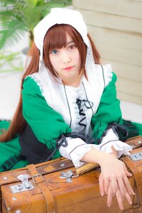 Rating: Safe Score: 0 Tags: 1girl blurry blurry_background brown_hair closed_mouth depth_of_field dress green_dress heterochromia lips long_hair long_sleeves looking_at_viewer photo red_eyes solo suiseiseki User: admin