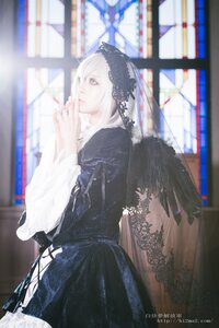 Rating: Safe Score: 0 Tags: 1girl black_dress blue_eyes blurry blurry_background blurry_foreground depth_of_field dress feathered_wings long_sleeves nail_polish photo solo stained_glass standing suigintou veil white_hair white_wings wings User: admin