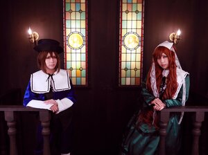 Rating: Safe Score: 0 Tags: blue_eyes brown_hair candle cloak hair_over_one_eye hands_clasped hat holding_hands indoors long_hair multiple_cosplay multiple_girls own_hands_together stained_glass standing tagme top_hat window User: admin