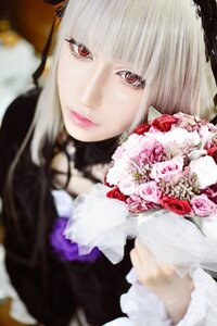Rating: Safe Score: 0 Tags: 1girl blonde_hair blurry bouquet depth_of_field flower lips lolita_fashion looking_at_viewer photo pink_rose red_eyes red_flower red_rose rose solo suigintou User: admin