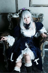 Rating: Safe Score: 0 Tags: 1girl black_dress black_legwear dress frills gothic_lolita lolita_fashion long_hair silver_hair sitting solo suigintou thighhighs white_hair User: admin