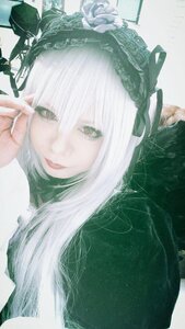 Rating: Safe Score: 0 Tags: 1girl bangs closed_mouth eyelashes flower green_eyes lips long_hair looking_at_viewer portrait ribbon solo suigintou white_hair User: admin