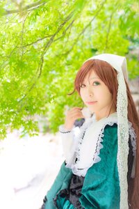 Rating: Safe Score: 0 Tags: 1girl blurry brown_hair depth_of_field dress green_eyes head_scarf long_sleeves looking_at_viewer outdoors smile solo suiseiseki User: admin