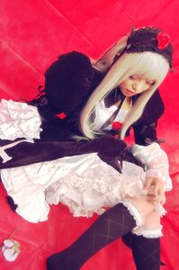 Rating: Safe Score: 0 Tags: 1girl argyle black_legwear blonde_hair dress flower frills gothic_lolita lace lips long_hair long_sleeves sitting solo suigintou thighhighs User: admin