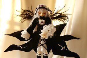 Rating: Safe Score: 0 Tags: 1girl black_dress black_wings closed_eyes closed_mouth cross doll dress flower frills hairband lace long_hair long_sleeves ribbon rose silver_hair solo standing suigintou very_long_hair white_flower wings User: admin