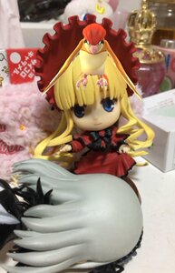 Rating: Safe Score: 0 Tags: 1girl blonde_hair blue_eyes blurry bow depth_of_field doll dress figure frills hat long_hair long_sleeves photo photo_background red_dress shinku solo very_long_hair User: admin